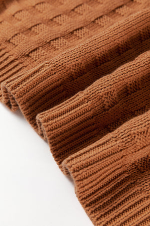 Camel textured knit boxy top with ribbed cuffs and a subtle checkerboard pattern.