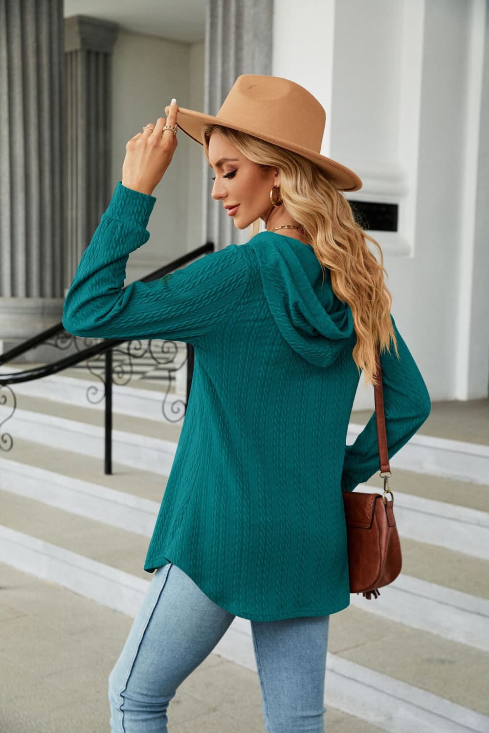 Teal textured henley hooded tunic with long sleeves and a relaxed fit.
