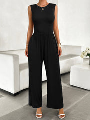 Black ribbed bodice wide leg jumpsuit with a corset detail and elastic waist.