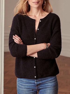 Black cashmere button cardigan with a round neckline and three-quarter sleeves.