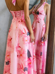 Pink floral halter neck maxi dress with lace-up back detail