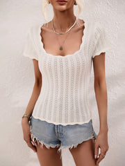 White knit top with scalloped square neckline and open stitch detail.