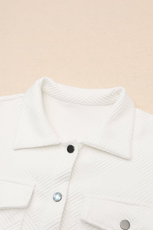 Textured ivory overshirt with patch pockets and button details.