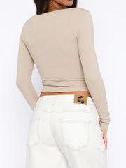 Button-down ribbed crop top in Dust Storm, long sleeve, crew neck, fitted.