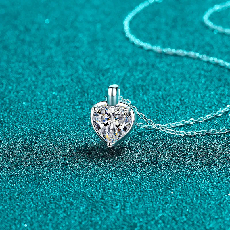 Silver chain necklace with a heart cut moissanite pendant