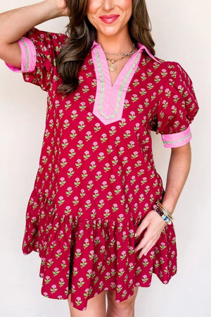Red floral mini dress with V-neck, puff sleeves, and ruffled hem.