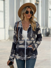 Aztec print zip-up hooded jacket in gray with white zipper and drawstring.