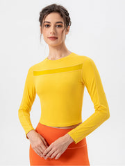 Neon Yellow long sleeve crop top with mesh panel detail