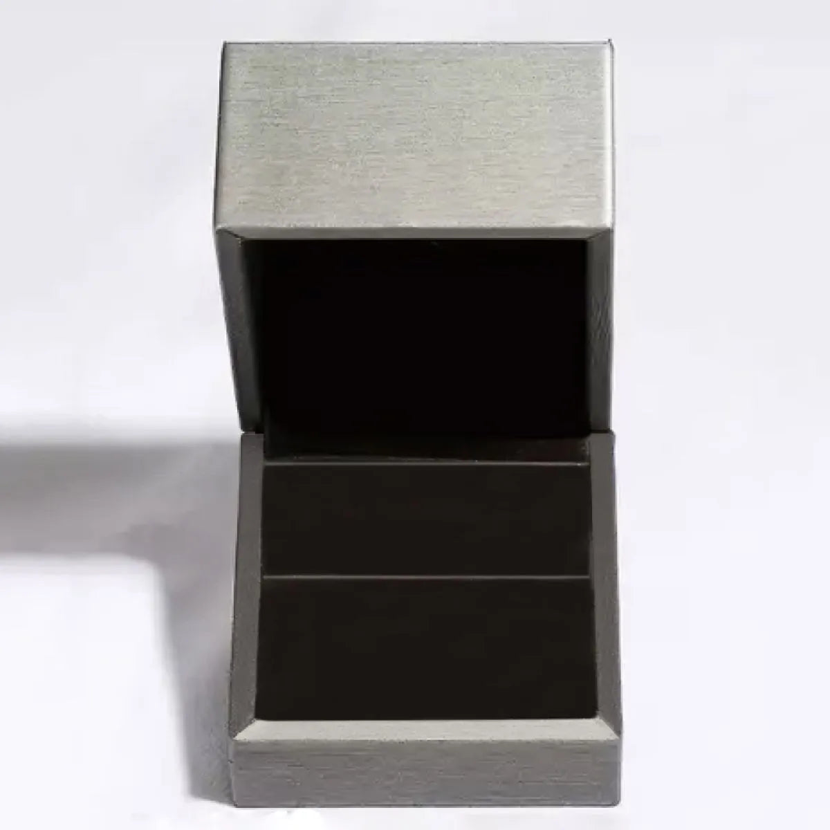 Open grey and black ring box with two compartments