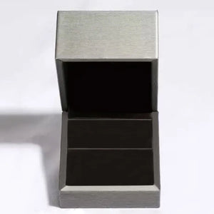 Open grey and black ring box with two compartments