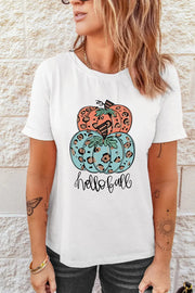 White t-shirt with stacked leopard print pumpkins and "hello fall" graphic.