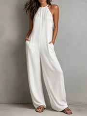 White halter neck wide leg romper with pockets