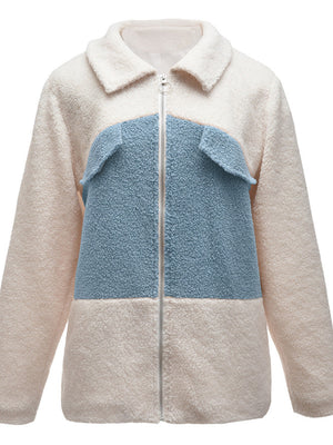 Colorblock shearling zip-up jacket in cream and light blue with two chest pockets.