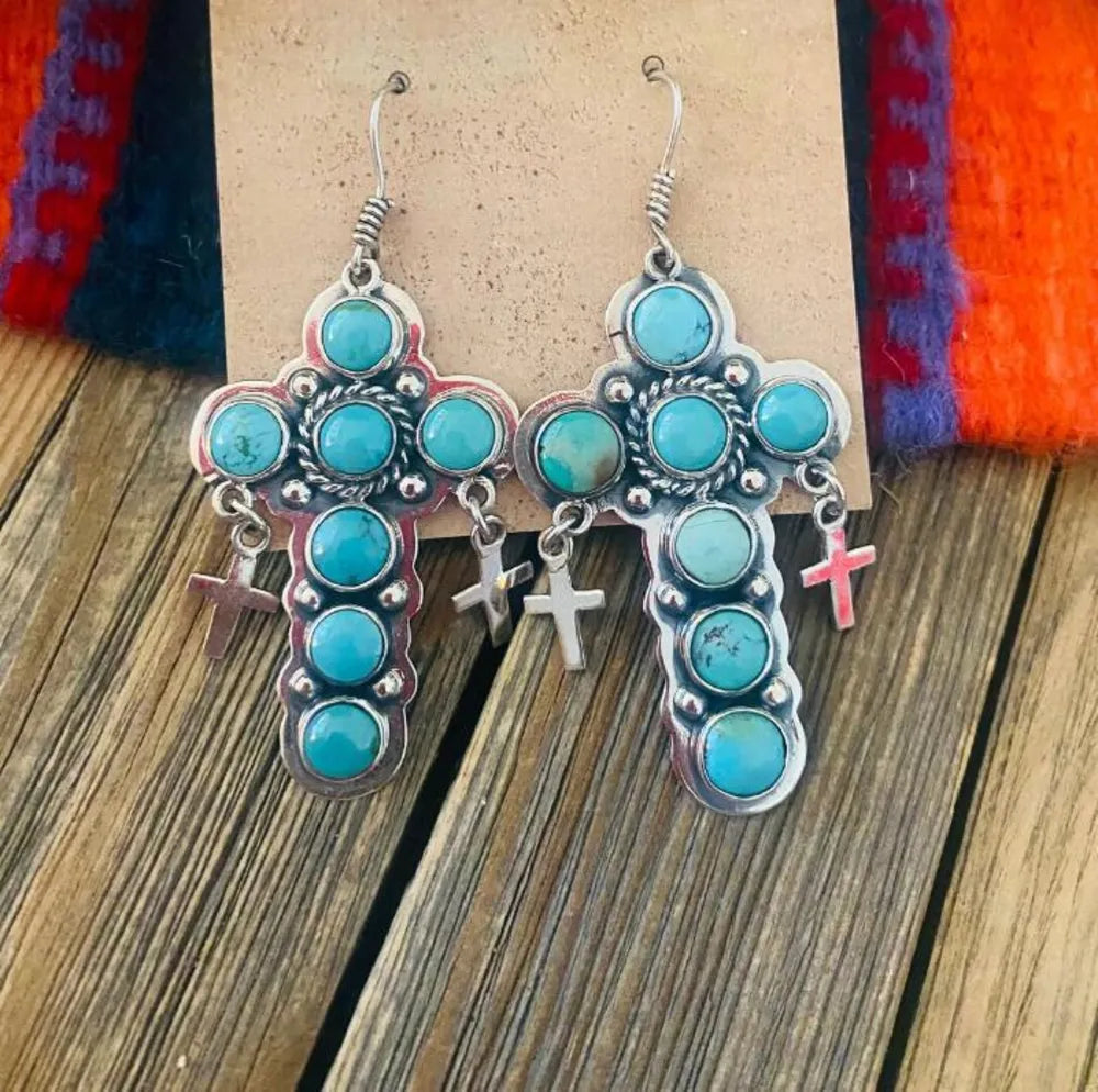 Southwestern turquoise cross dangle earrings with small cross charms.