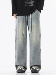 Men's light wash vintage distressed wide leg jeans with drawstring waist.