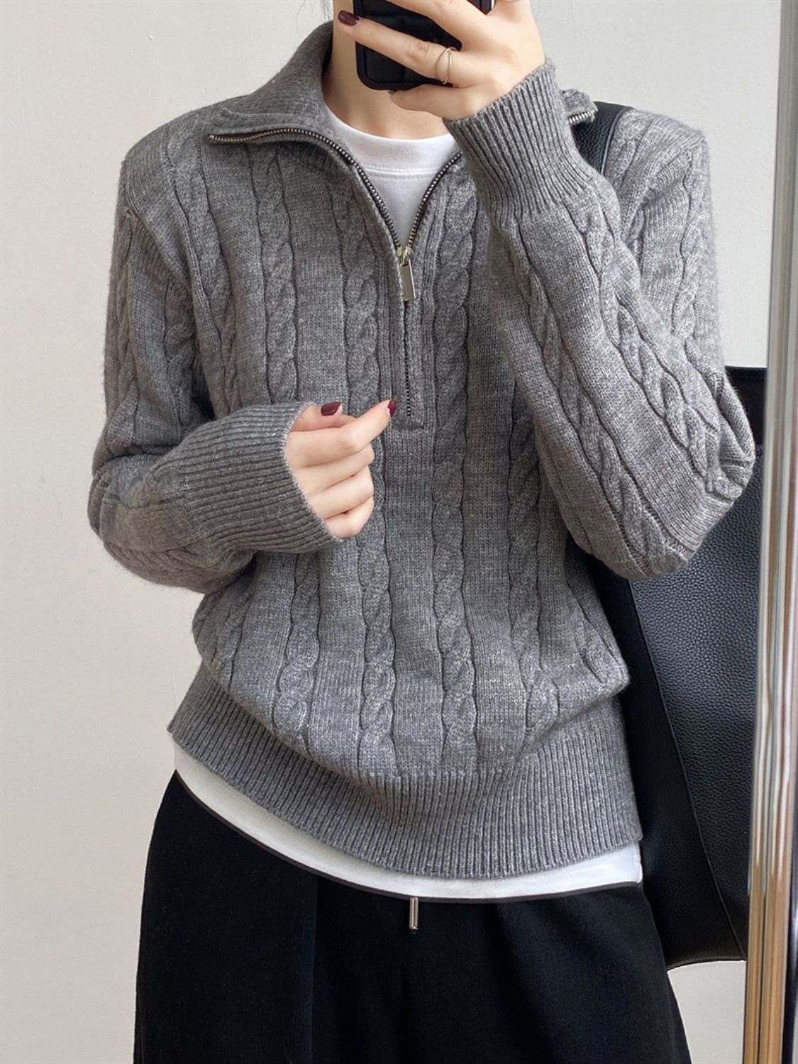 Dark Gray cable knit quarter-zip pullover sweater with a quarter-zip neckline.