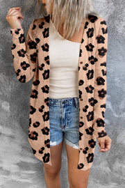 Tan leopard print open-front duster cardigan with buttons and long sleeves.