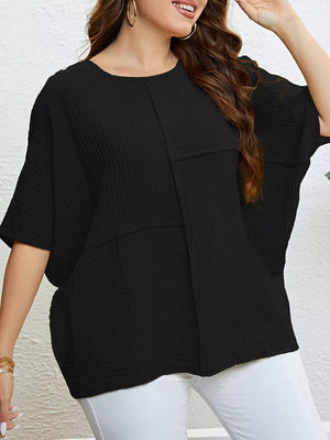Black textured relaxed-fit t-shirt with short sleeves and a crew neck.