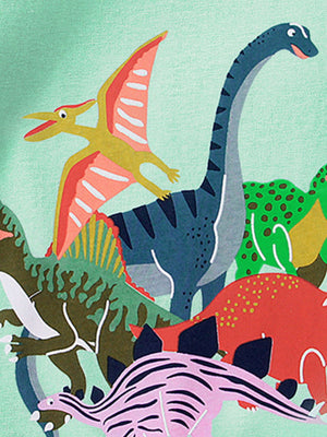 Toddler crew-neck tee with a colorful dinosaur print on a light green background.