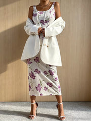 Floral crop top and skirt set with corset seams, styled with a white blazer.