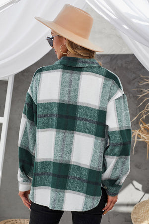Oversized green and white checkered shacket with button-down front and collared neckline.