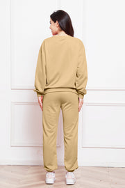 Khaki relaxed fit loungewear set with crewneck sweatshirt and cuffed sweatpants.