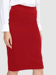 Red pencil skirt with a high waist, shown with a white blouse.