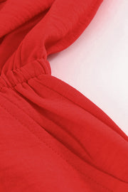 Scarlett playsuit with blouson sleeves and tie-front detail