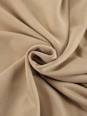 Camel quarter zip top and pants set fabric detail
