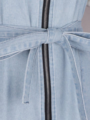 Light wash denim mini dress with zipper front and tie waist