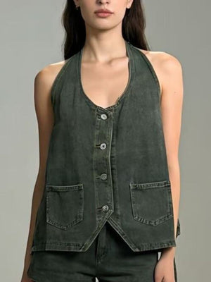 Button-down denim halter vest in dark gray with two front pockets and a V-neckline.