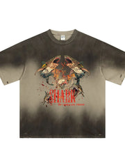 Distressed khaki t-shirt with a bold shark graphic and distressed details.