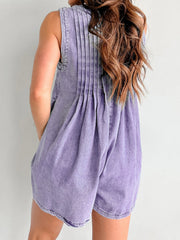 Lavender denim playsuit with pleated back detail and A-line shorts.