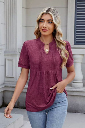Plum purple pleated yoke keyhole neckline short sleeve blouse.