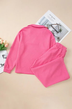 Hot Pink quilted knit collared loungewear set with textured geometric pattern.