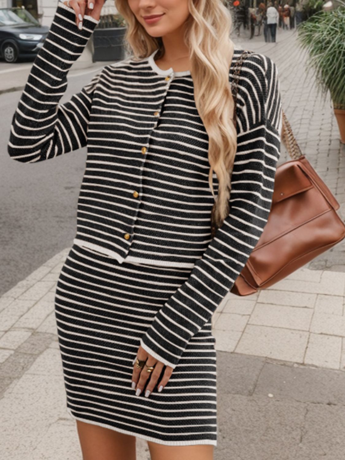 Black and white striped knit co-ord set with buttoned cardigan and mini skirt.
