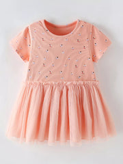Peach dancer print cotton dress with tulle skirt and crew neck.