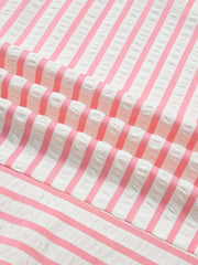 Pink and white striped textured blouse fabric detail