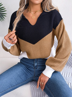 Chevron block knit polo sweater in camel, black, and white with a V-neck.