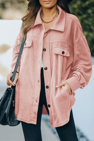 Fleece shirt jacket in Blush Pink with patch pockets and button front.