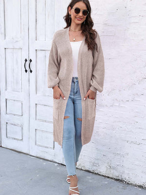 Ribbed knit maxi cardigan in Khaki with pockets and balloon sleeves.