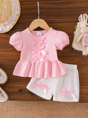 Children's Ribbed Bow Top And Shorts Set in Pink, front view