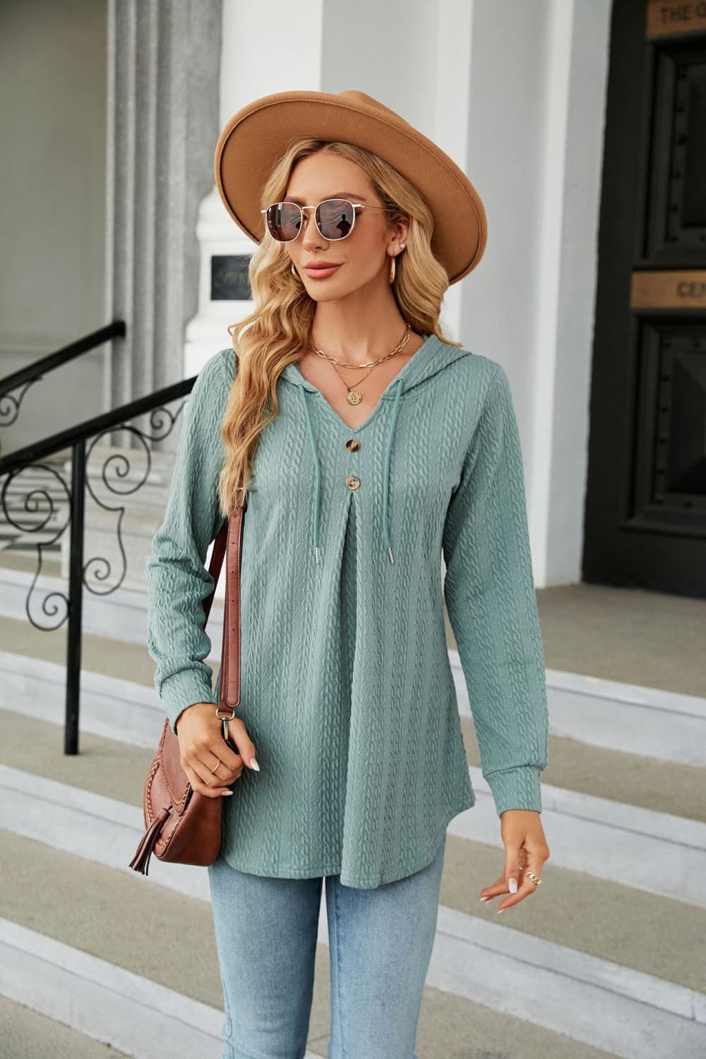 Textured hooded tunic in Sage with button detail and drawstring neckline.