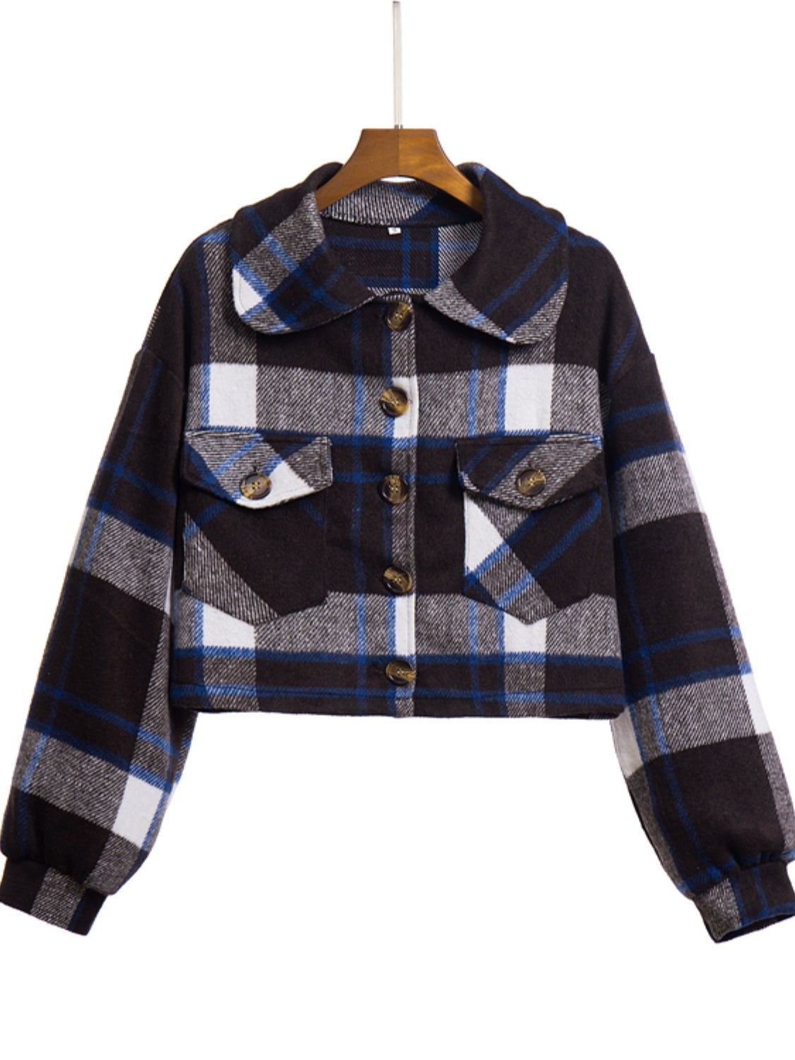 Chic plaid jacket in dark blue, white, and gray with buttoned chest pockets and a collared neckline.