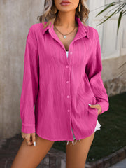 Textured pleat oversized button-down shirt in hot pink with long sleeves and a relaxed fit.