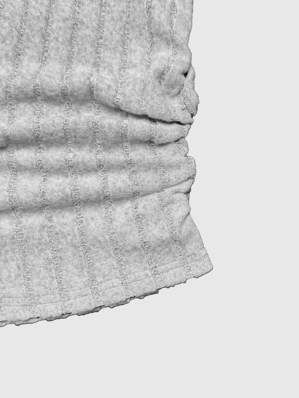 Grey ribbed knit crop top with ruched side detail and raw hem