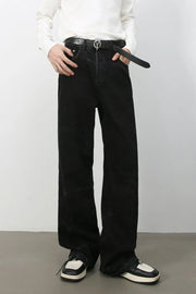 Faded black wide-leg denim jeans with a relaxed fit.