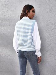 Light blue and white striped knit vest with a V-neck and ribbed trim.