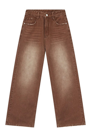 Brown faded wash wide leg denim trousers with distressed pocket details.