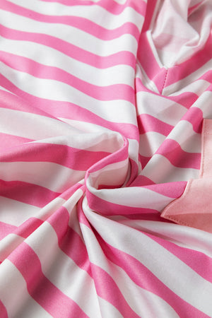 Striped V-neck t-shirt in blush pink with a pocket detail.